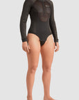 a woman wearing black body suit base layer for women from Pando