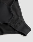 a crotch closure of a black body suit base layer for women from Pando