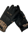 Black women's motorcycle gloves with colourful leopard skin details and with paw print details on the index and middle fingers.
