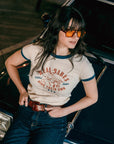 young dark haired woman wearing REAL BABES RIDE THEIR OWN retro style t-shirt