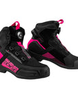 A pair of black and hot pink Shima road racing shoes shown from the side and front-three-quarter angles against a light gray background.