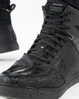 Rebel waterproof motorcycle sneakers with black laces from Shima from the front with water on