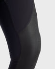 A close up of the knee wearing Pando Moto SKIN AAA armoured base layer leggings in black