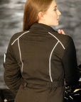 A woman wearing black motorcycle jacket from Moto Girl