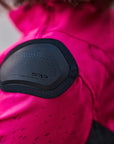 A close up of the slider on the pink DRIFT motorcycle jacket from Shima