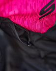 A close up of the ventilation panel on a pink DRIFT motorcycle jacket from Shima