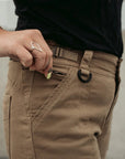 A close up of the pockets on beige women's motorcycle cargo pants from mOTO gIRL