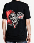 A woman wearing black Pando Moto women's motorcycle t-shirt with red scull motive