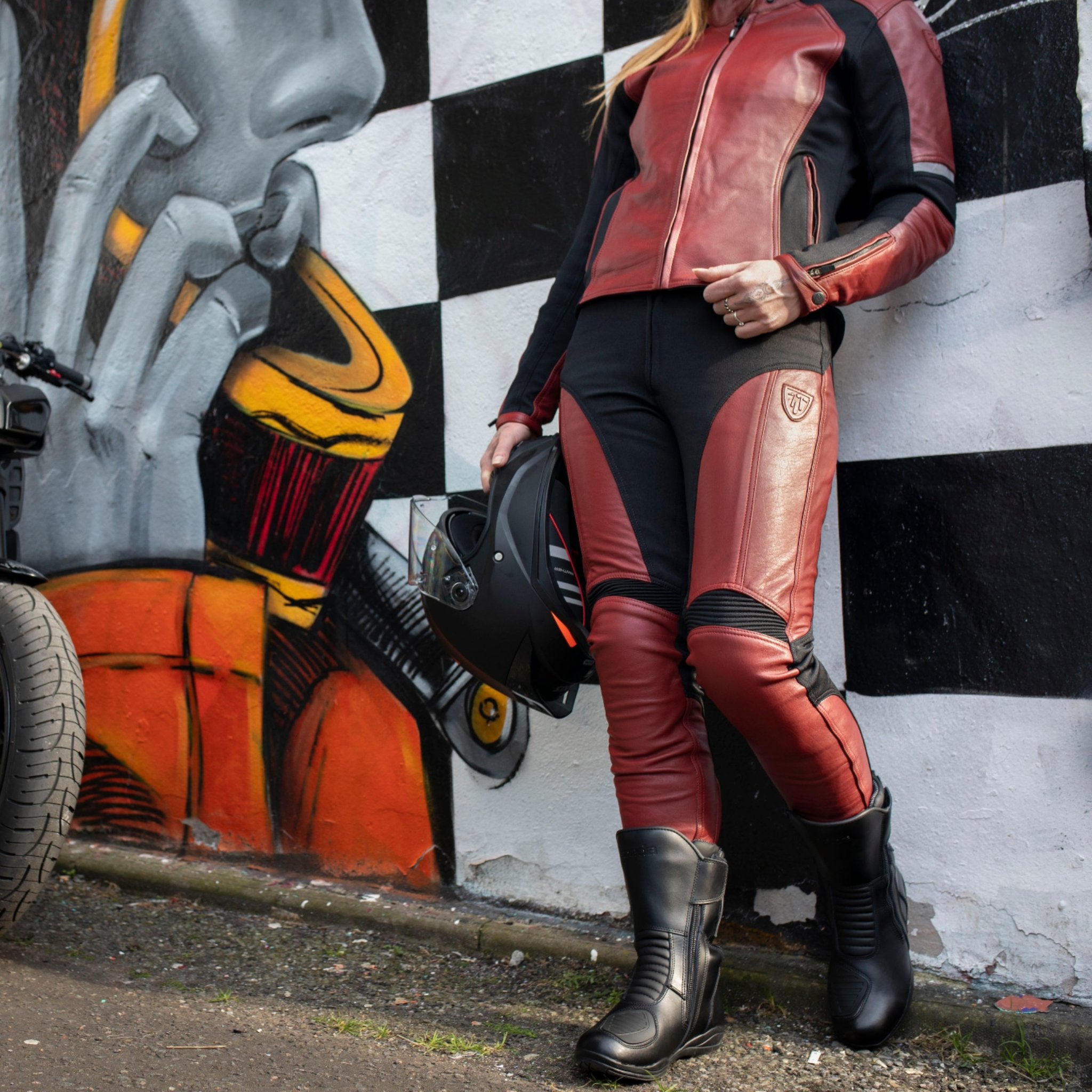 Woman wearing Red Fiona Motorcycle Trousers from Moto Girl