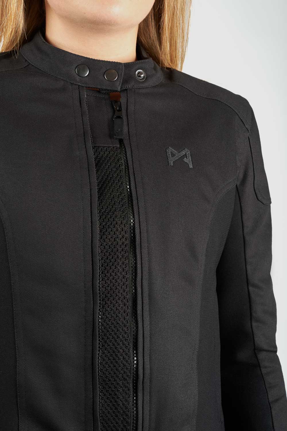 Black jacket with a brand logo on a white background