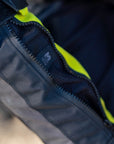 A close up of the sleeve zip on the shima motorcycle touring jacket for women in black/ fluo