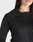 close up of a woman wearing black tight motorcycle underwear with Pando Moto Logo