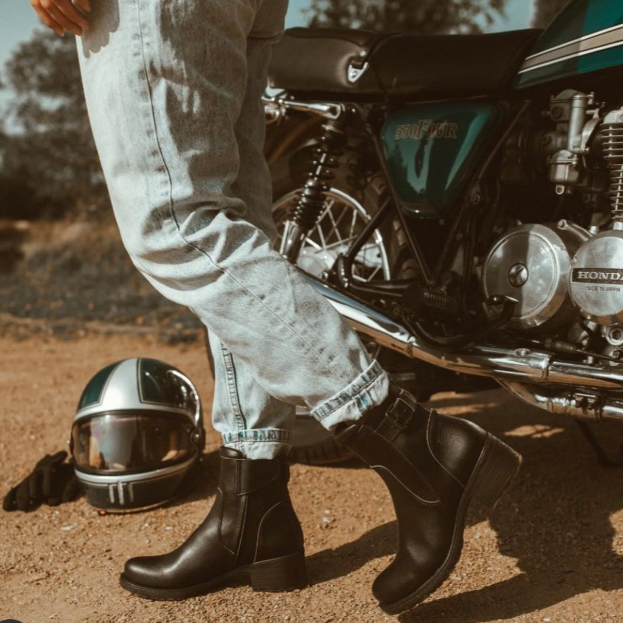 Woman wearing women's black leather motorcycle shoes 