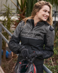 a smilling woman wearing grey motorcycle jacket SHIMA 